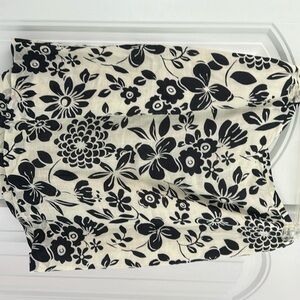 Ann Taylor lined skirt. Above-knee length. Cream/black floral.